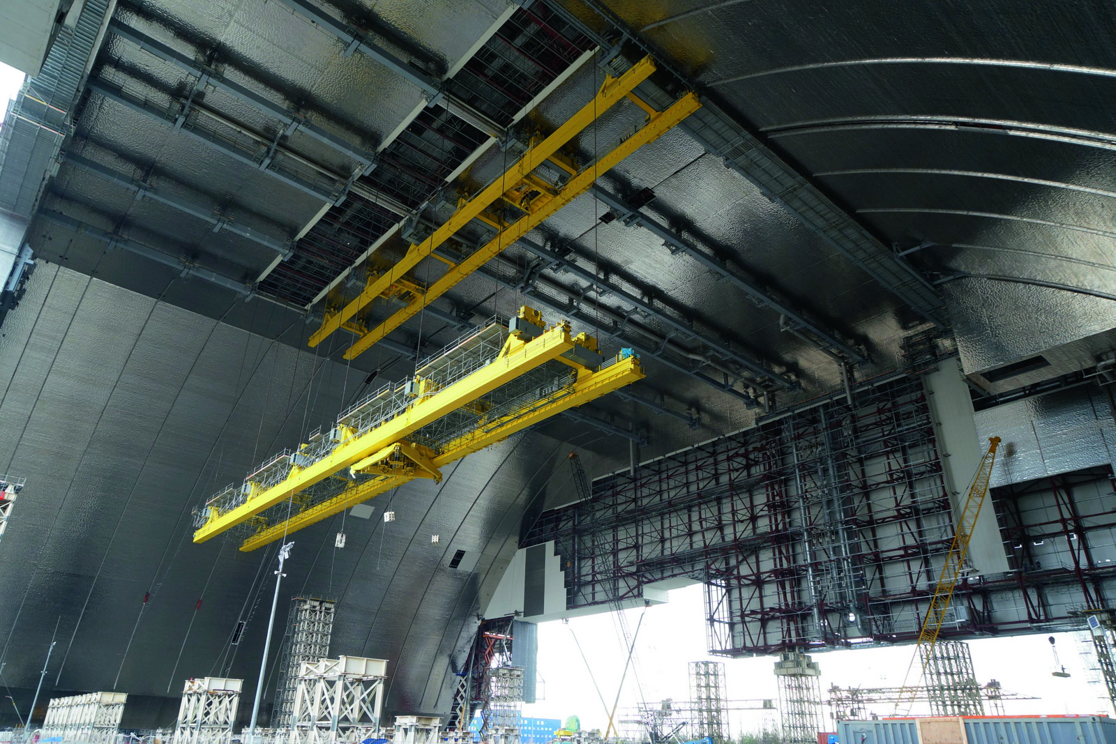 heavy lifting of a main crane system in Chernobyl new safe confinement